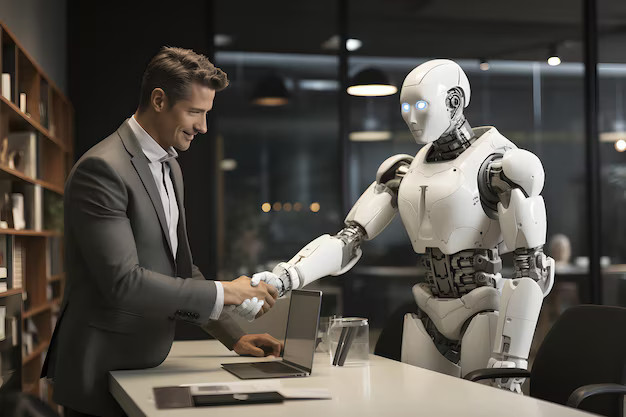 Travail collaboratif entre humains et robots – Crédit : Figure AI